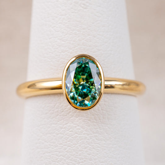 9ct Yellow Gold Teal Moissanite Oval Bezel Solitaire Ring - Hunters Fine Jewellery