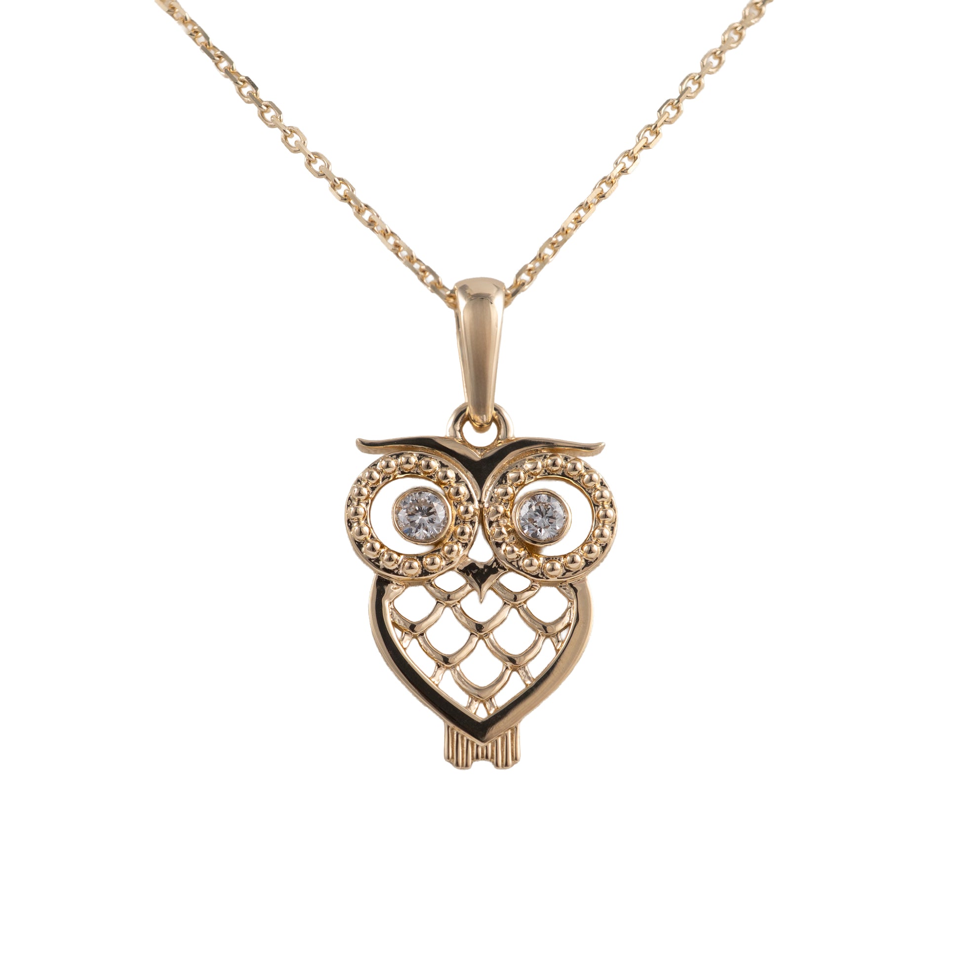 gold owl pendant with diamond eyes front on white background