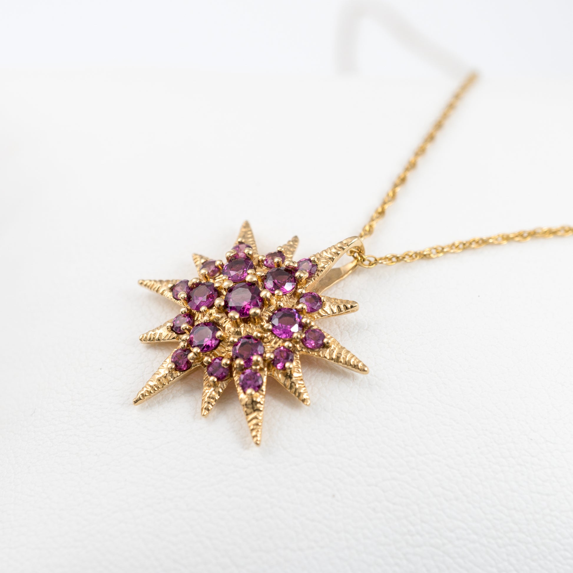 Gold Star Necklace Featuring Pink Topaz for a Chic Look