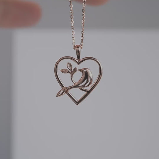 375 rose gold bird heart necklace product video