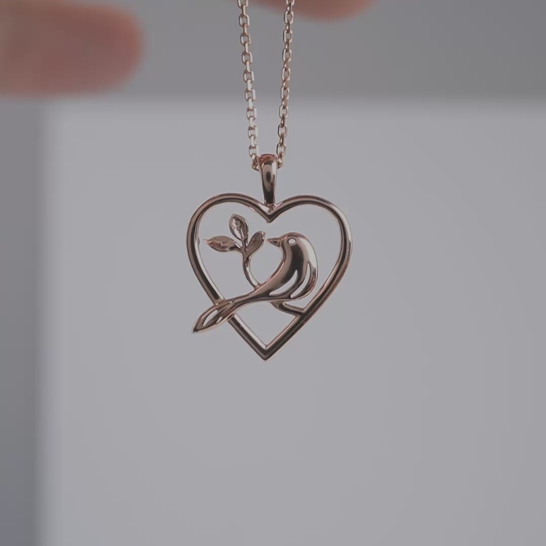 375 rose gold bird heart necklace product video