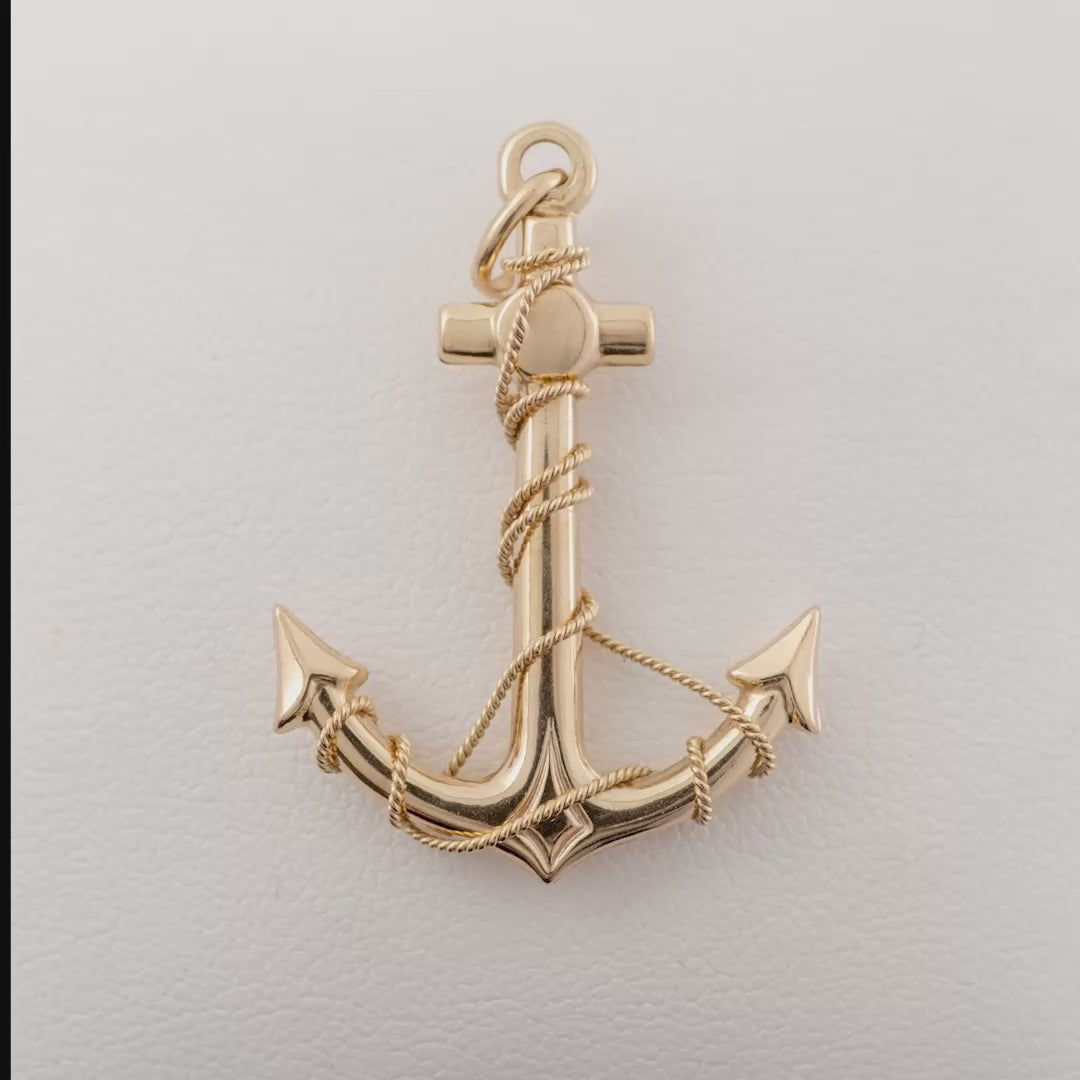 Product video of a 9ct gold anchor pendant being rotated to showcase its intricate rope detail, scale, and craftsmanship