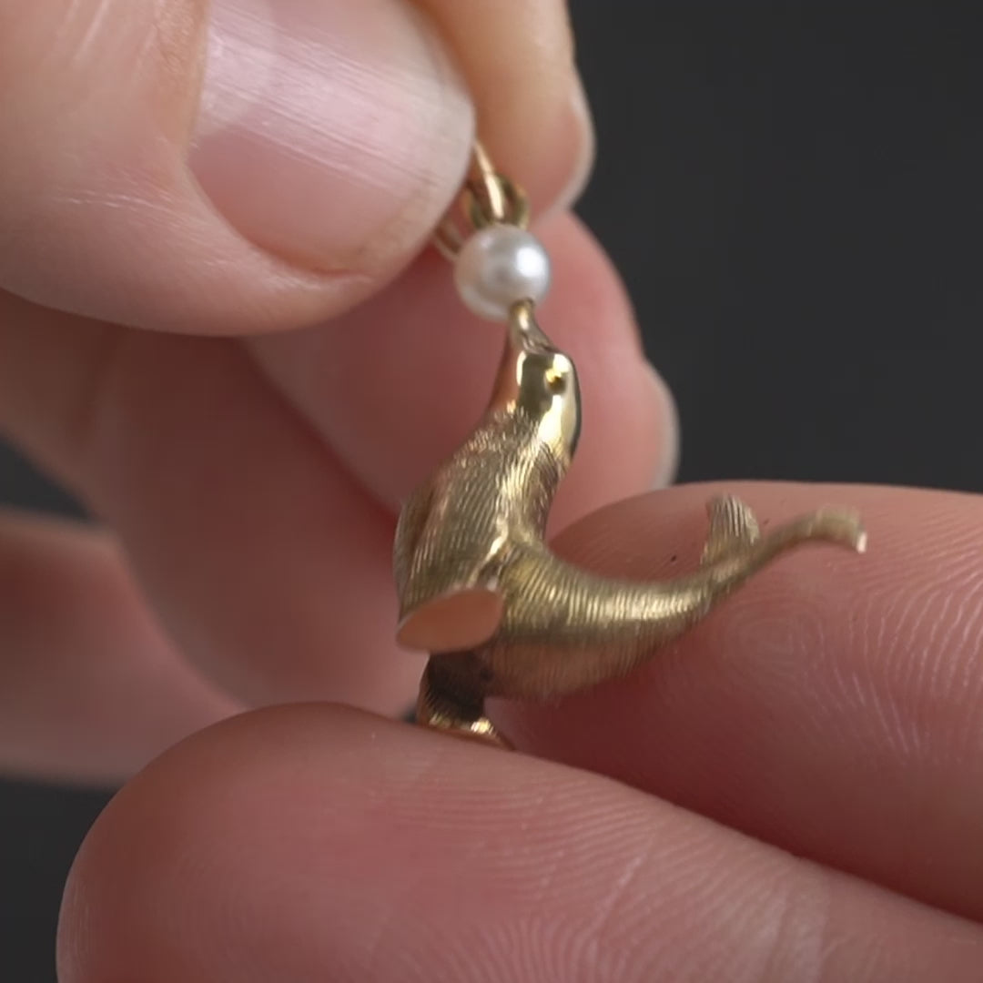 vintage gold seal charm displaying video