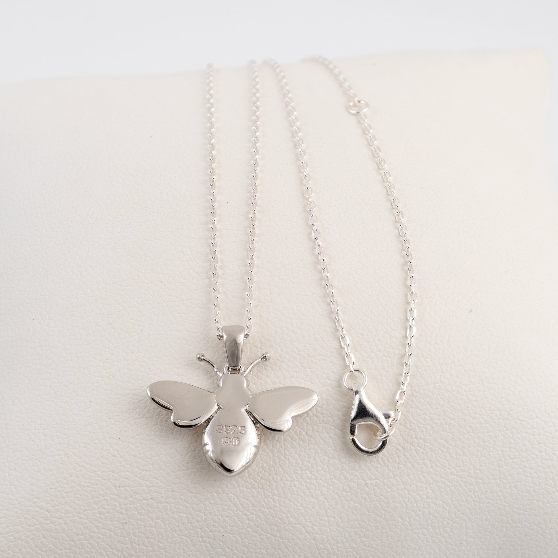 Back view of silver bee pendant necklace with lobster clasp