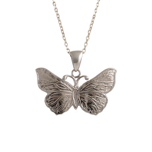 Silver butterfly pendant on a chain against a white background