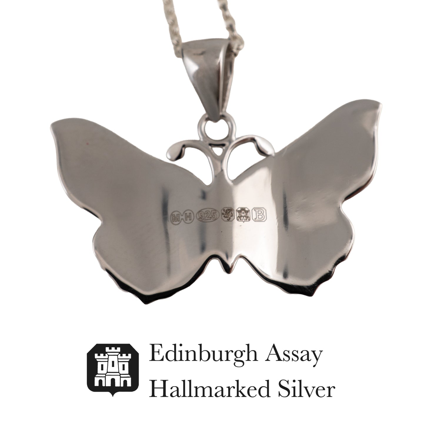 Silver butterfly pendant with 'Edinburgh Assay Hallmarked Silver' logo on a white background