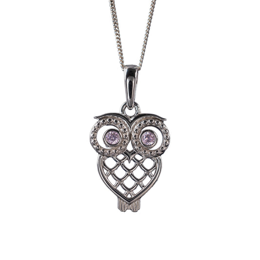 Silver owl pendant with pink gemstones on a white background