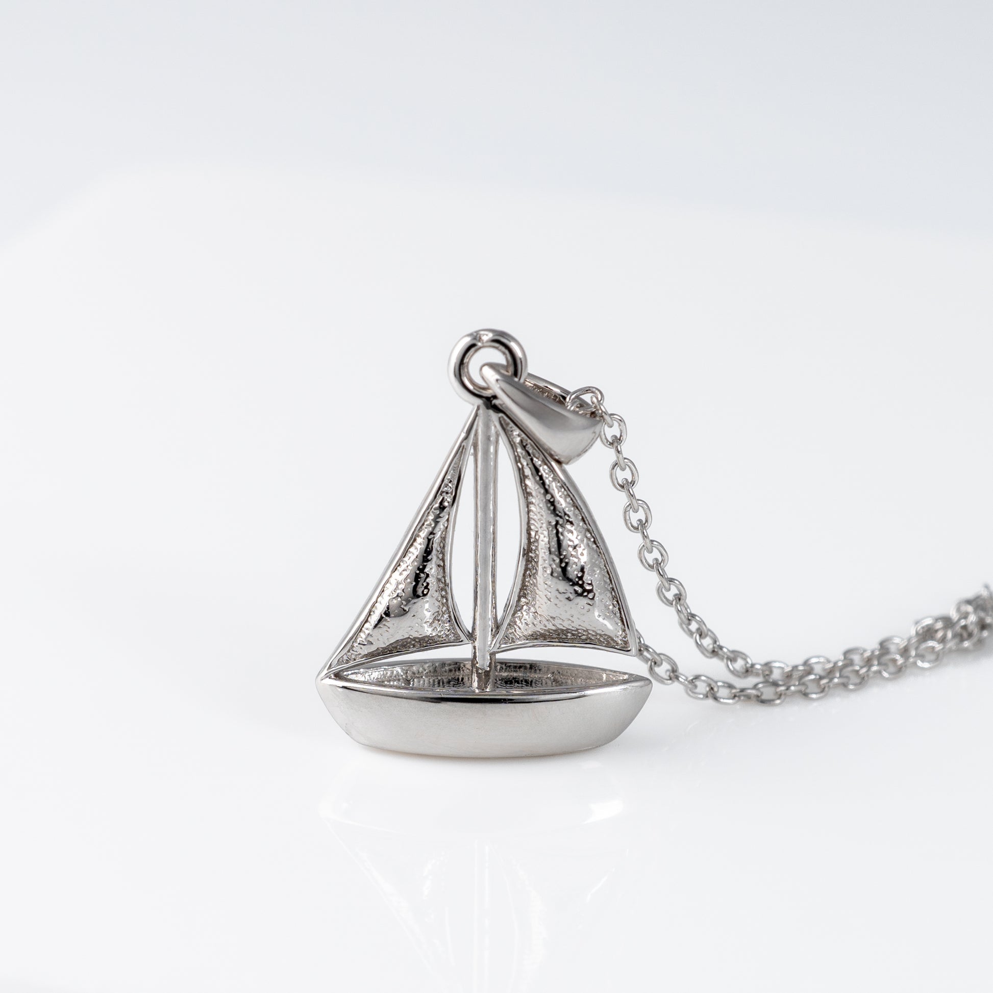 Silver sailing boat necklace