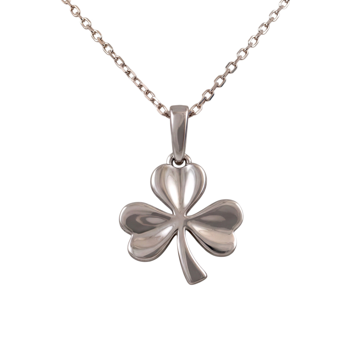 Silver shamrock necklace in sterling silver with three heart-shaped leaves white background