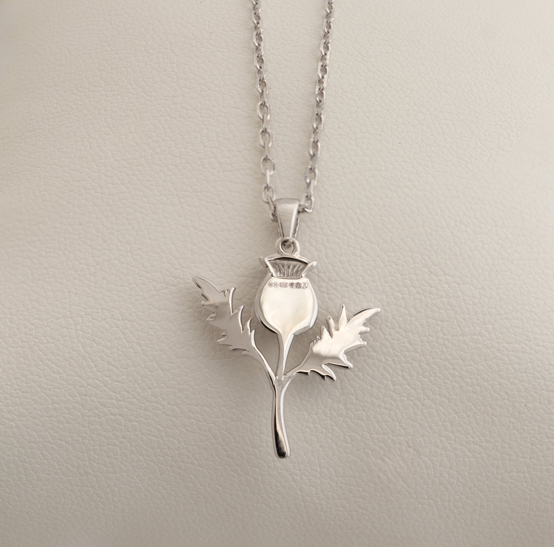 silver thistle necklace showing the Edinburgh hallmarks on the back