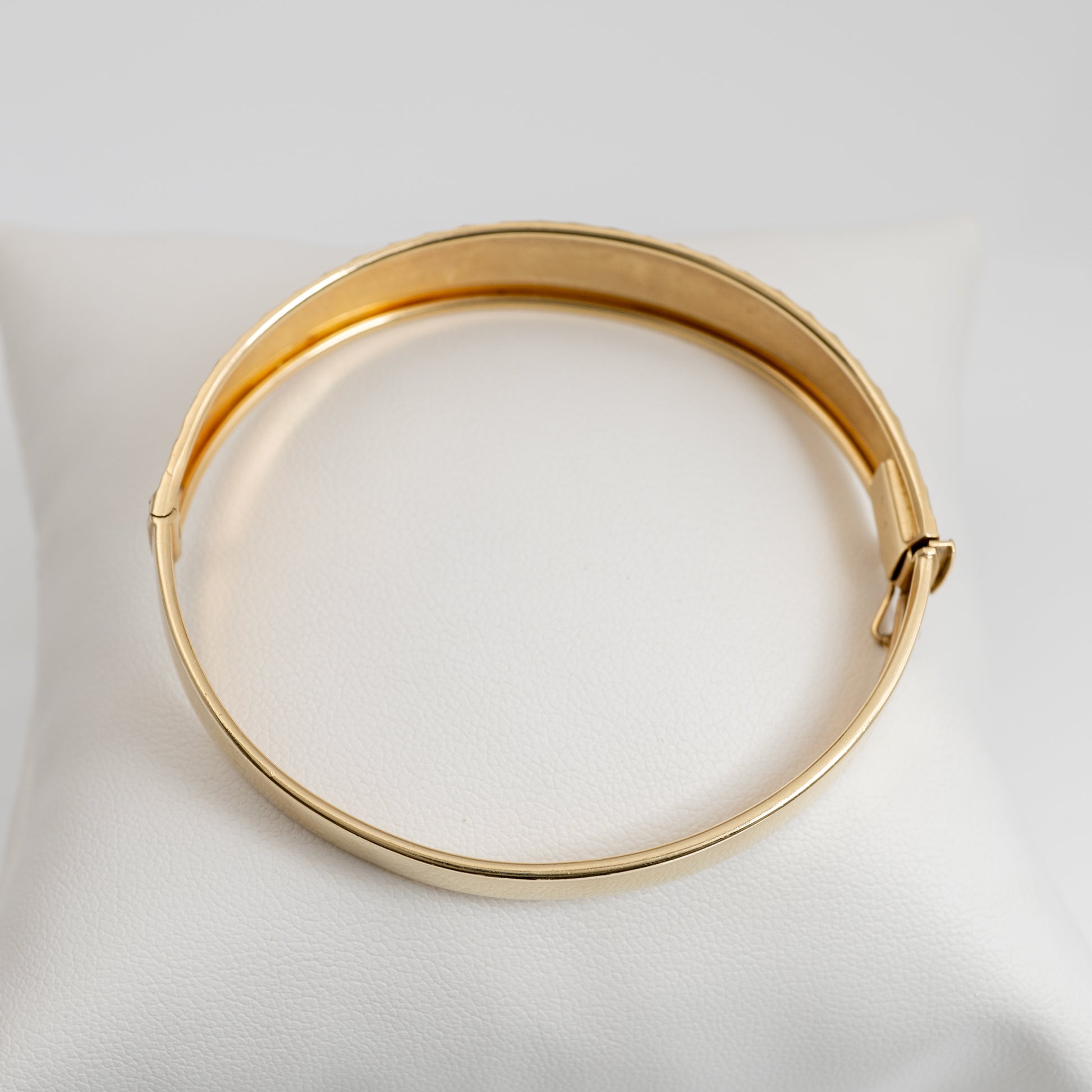 women gold bangle with slide lock clasp