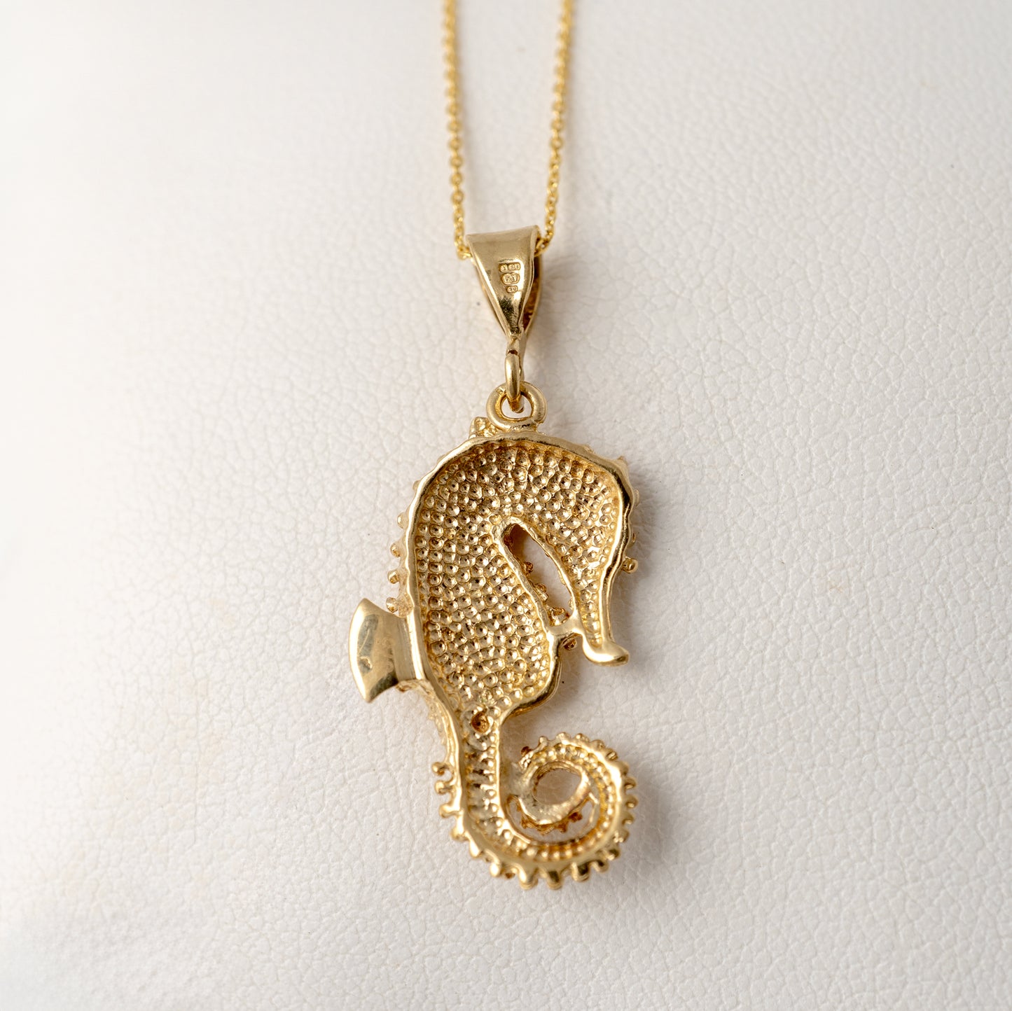 9ct gold seahorse pendant reverse side showing the hammered texture