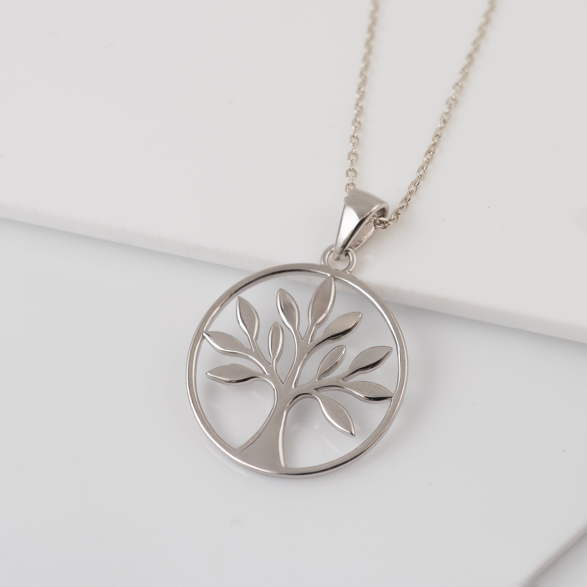 silver tree of life pendant close view on white