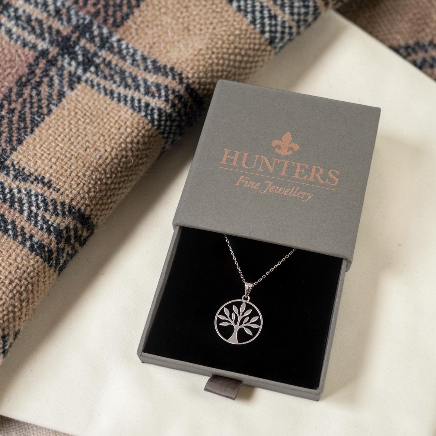 silver tree of life necklace in a hunters fine jewellery branded gift box