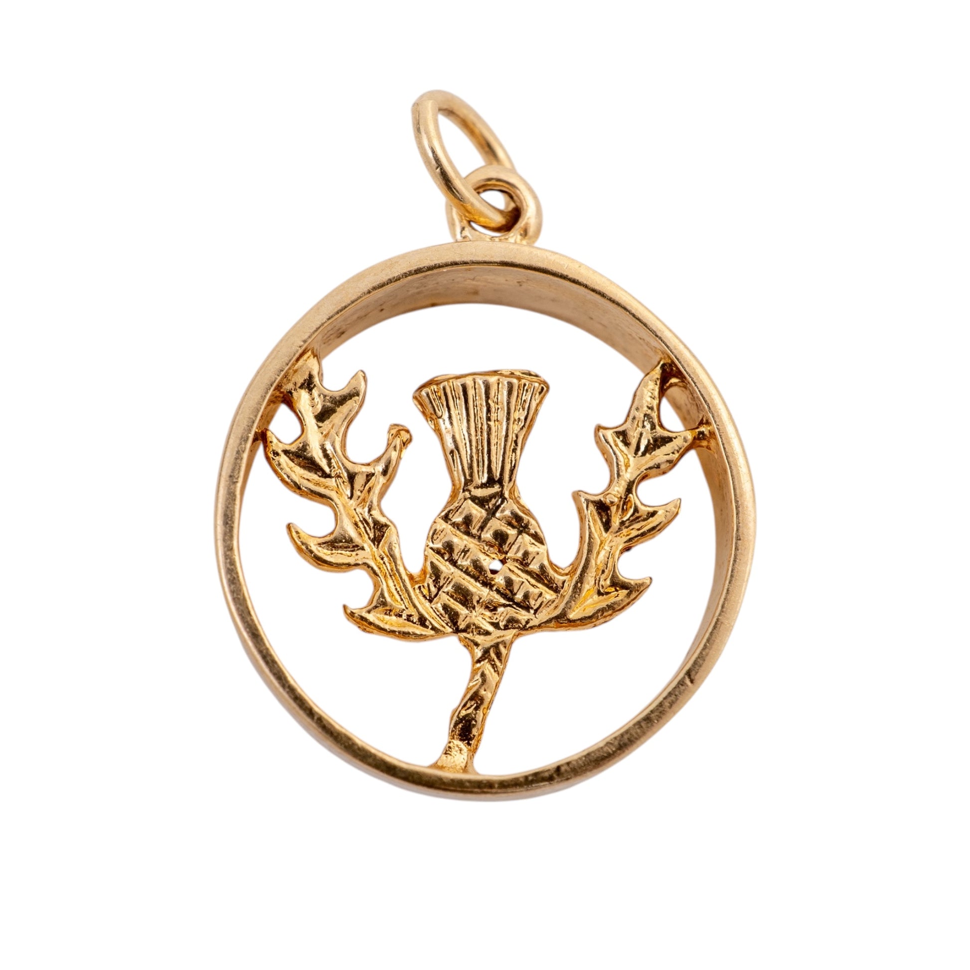 A 375 gold-Scottish thistle pendant charm featuring a circular frame with a raised thistle design in the centre, set against a plain white background.