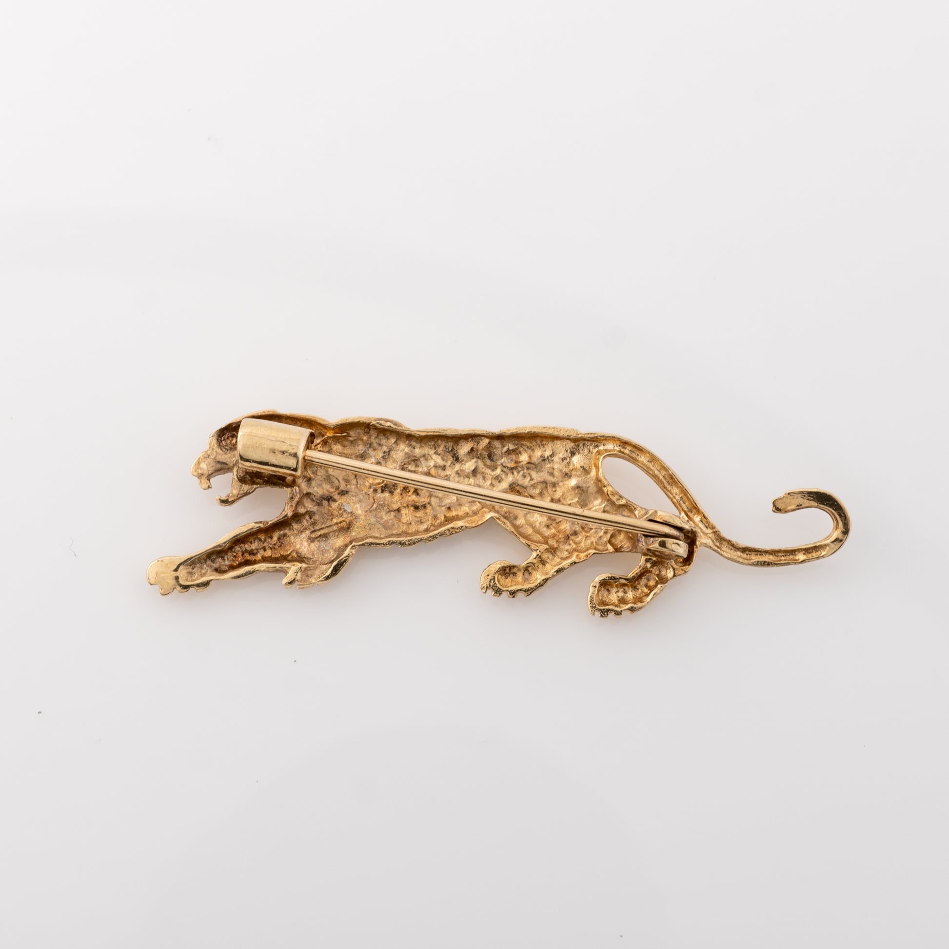 vintage tiger gold cat brooch with ruby-set eye showing the gold pin