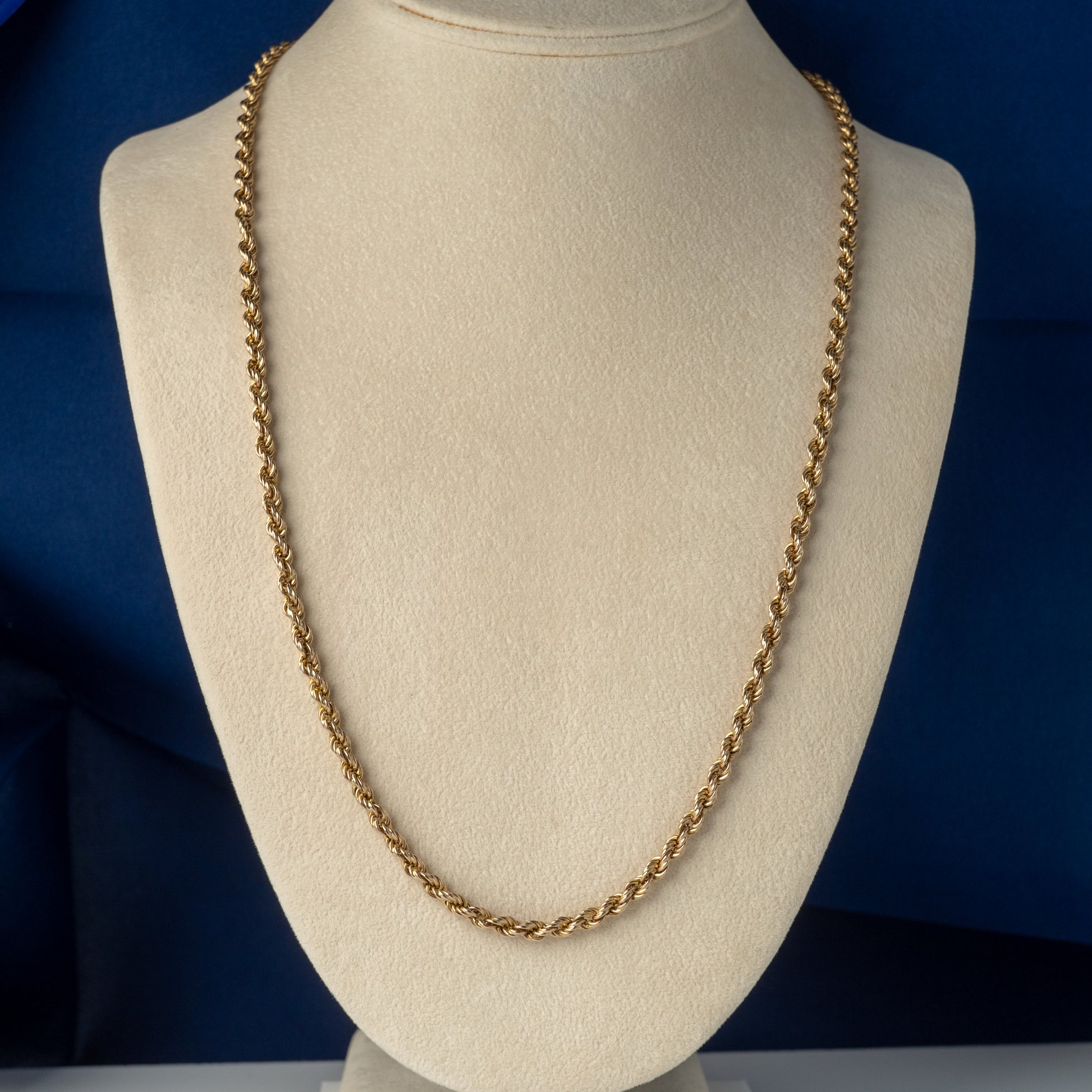 rope chain necklace on a display bust