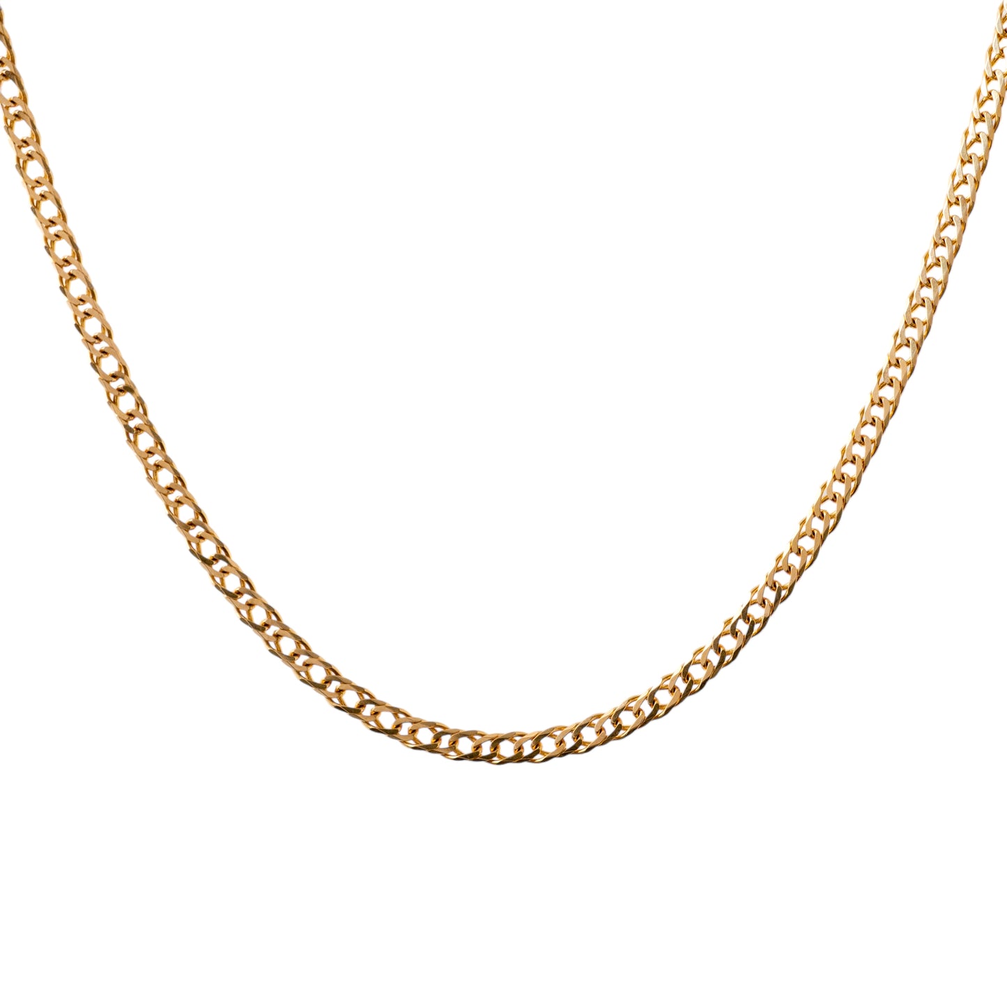 Close-up of a 9ct gold curb chain necklace, showcasing the classic flat link design