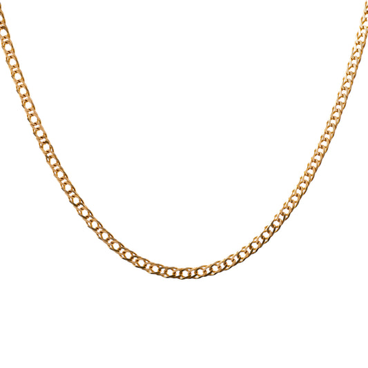 Close-up of a 9ct gold curb chain necklace, showcasing the classic flat link design