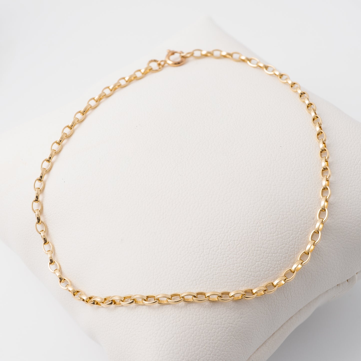 Close-up of gold belcher links bracelet