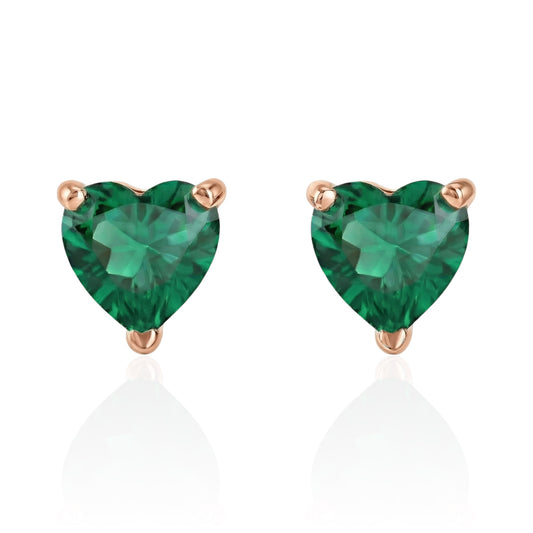 emerald heart earrings with rose gold posts on a white background