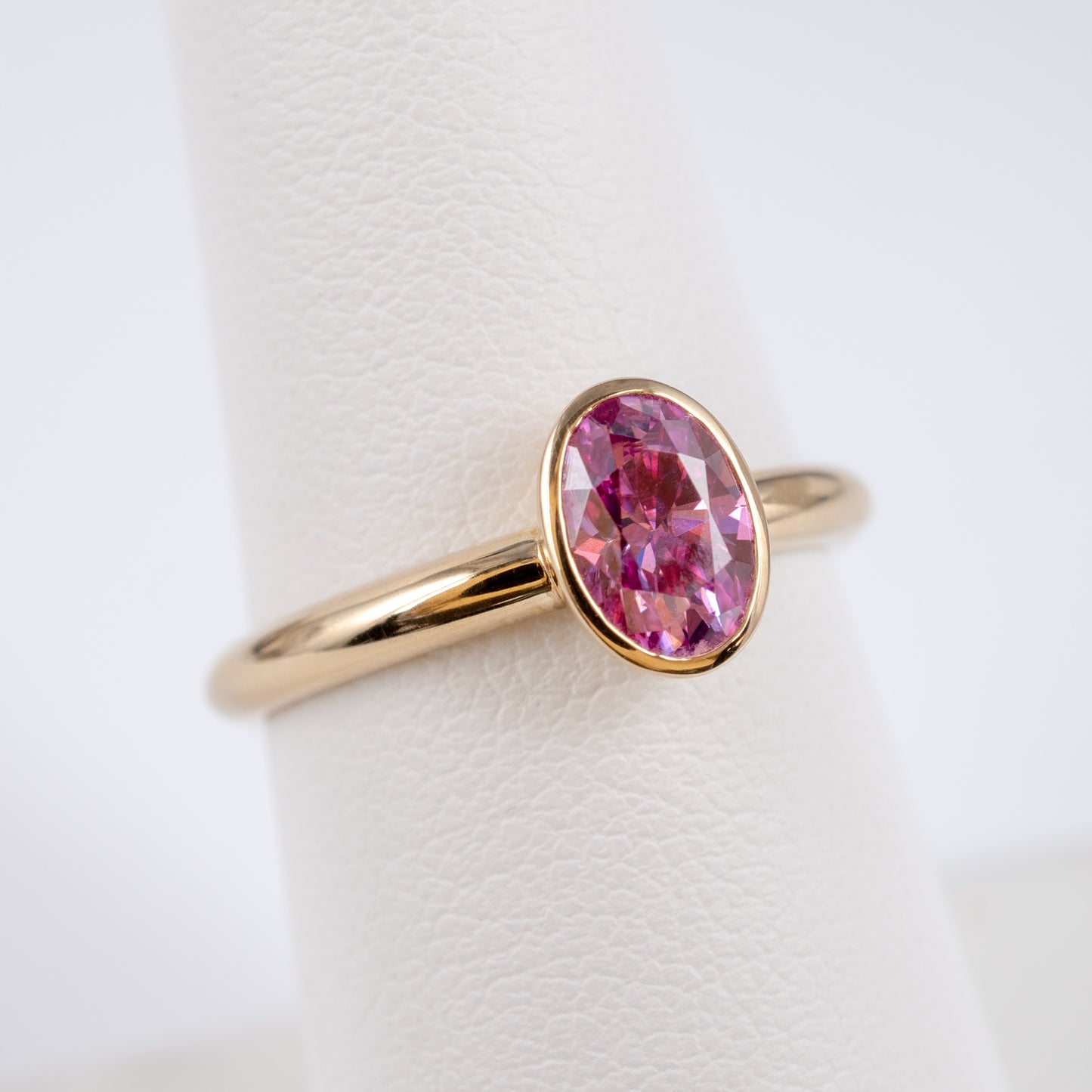 oval pink moissanite bezel ring