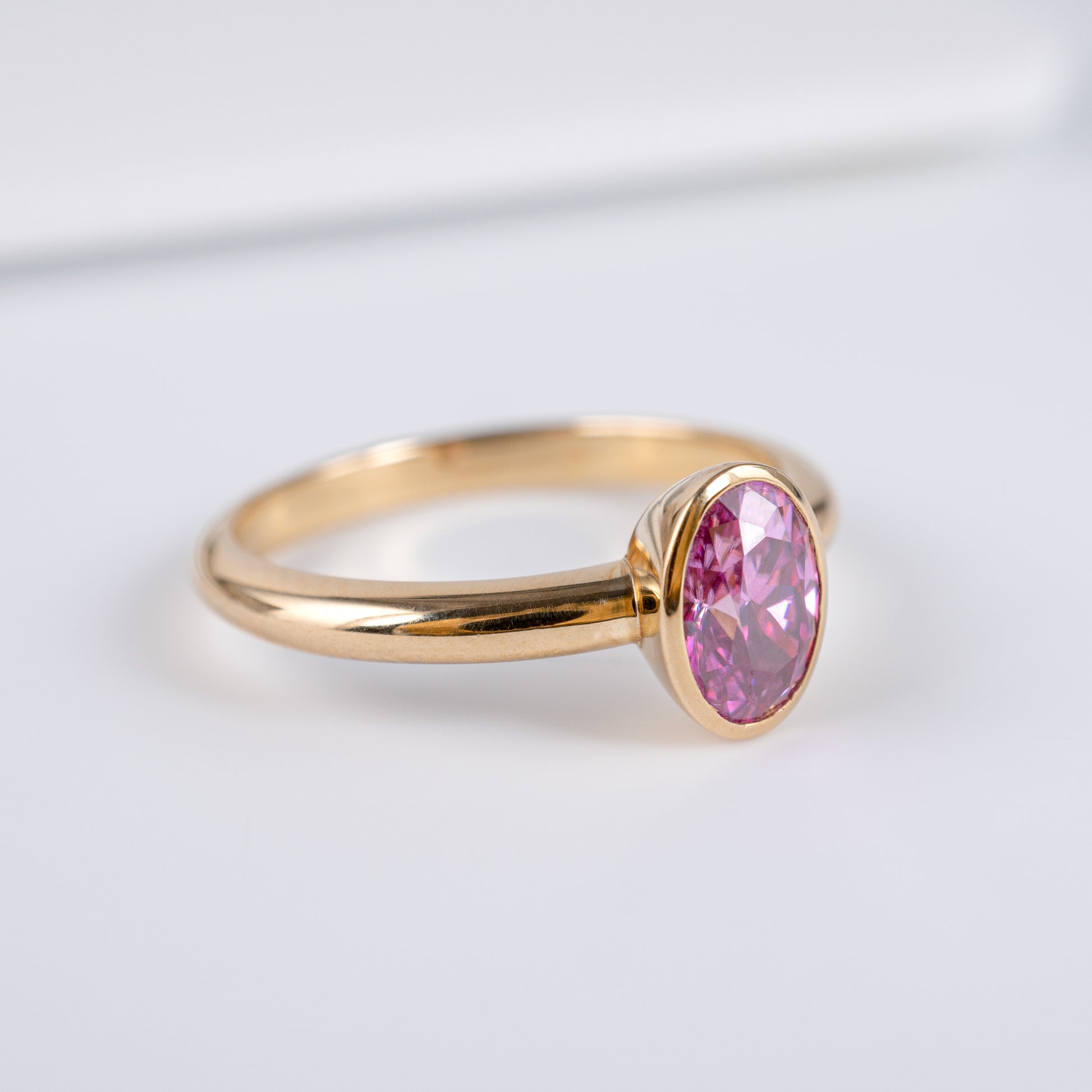 oval pink moissanite gold ring