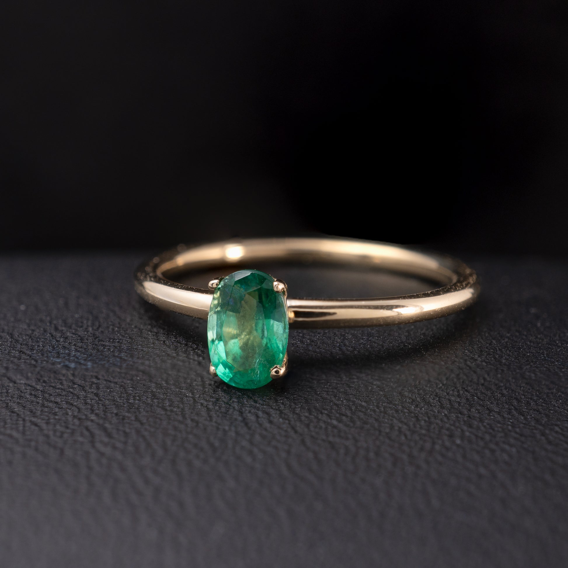 emerald oval prong ring yellow gold